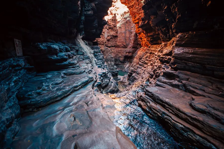 Red gorge walls and emerald pool in Karijini National Park
