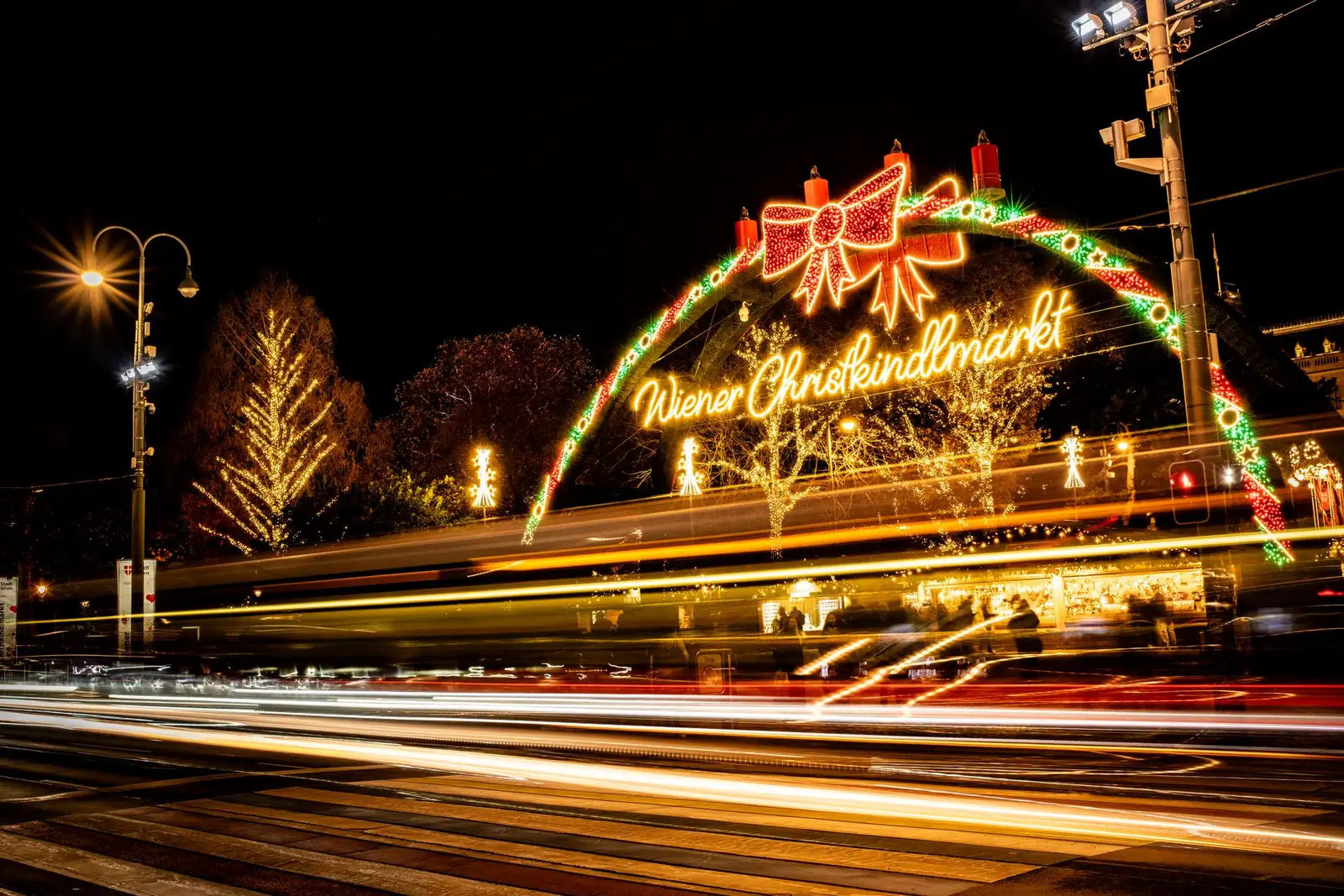 Vienna Christmas market with festive lights and mulled wine stalls