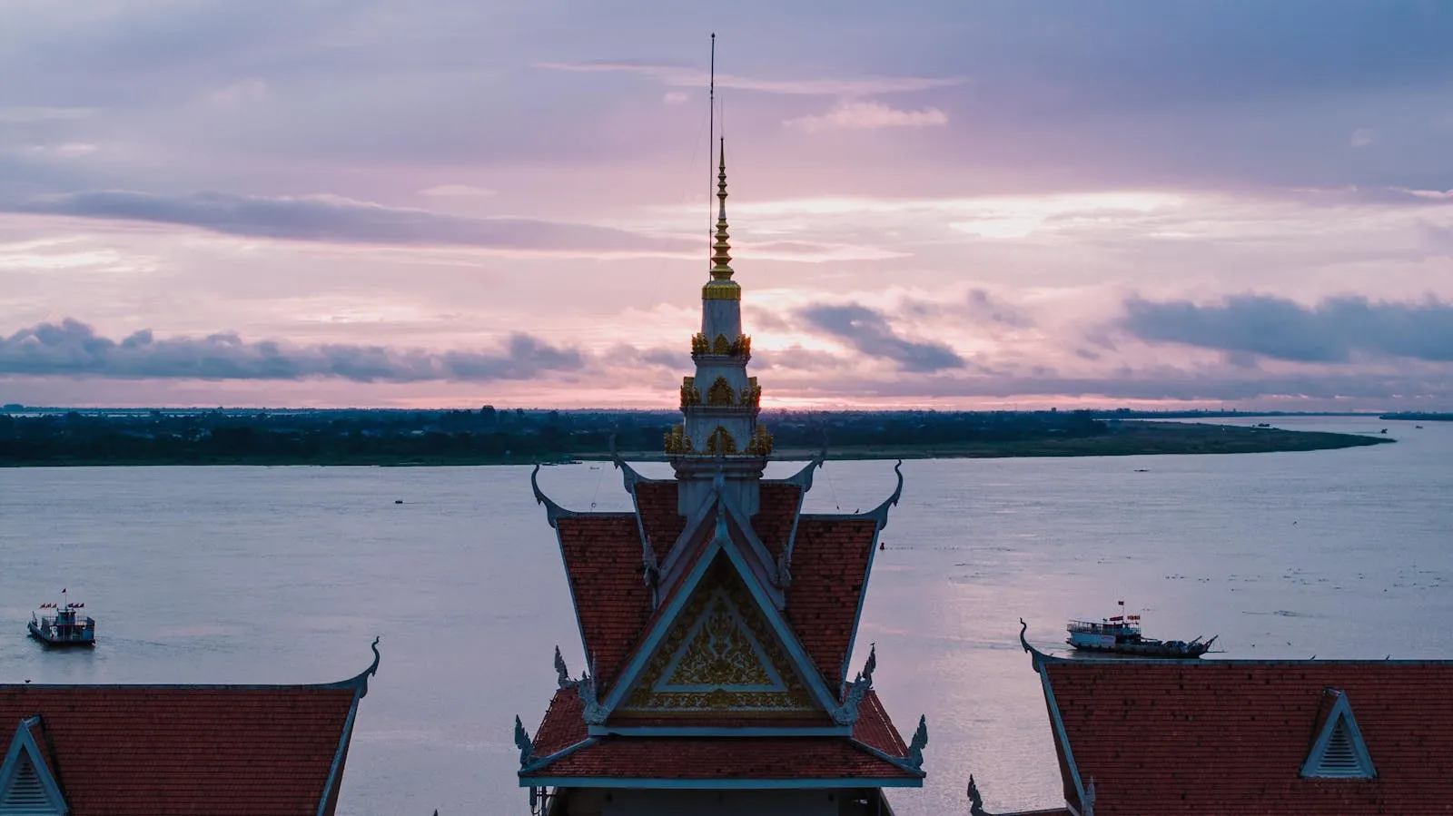 Discover the modern skyline and bustling streets of Phnom Penh from an aerial perspective.