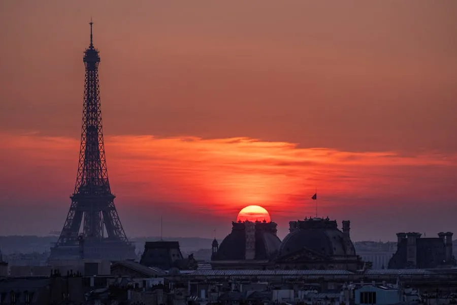 Eiffel Tower at sunset with golden Parisian skyline
