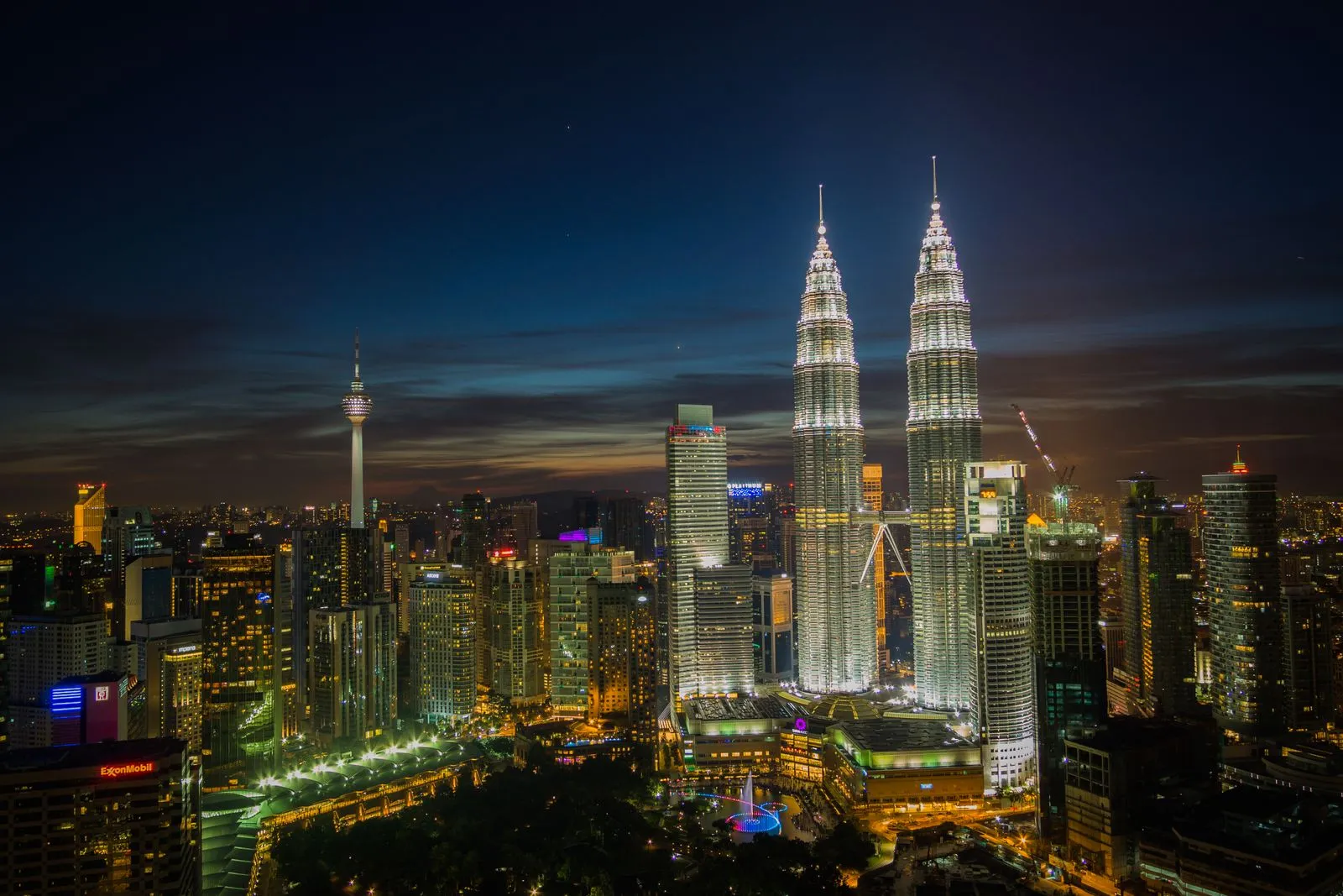 Entrance of Petronas Towers showcasing modern architectural design in Kuala Lumpur, Malaysia.