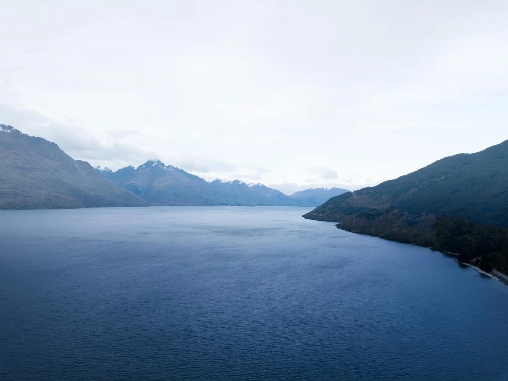Aerial panorama of the New Zealand landscape with mountains and fjords