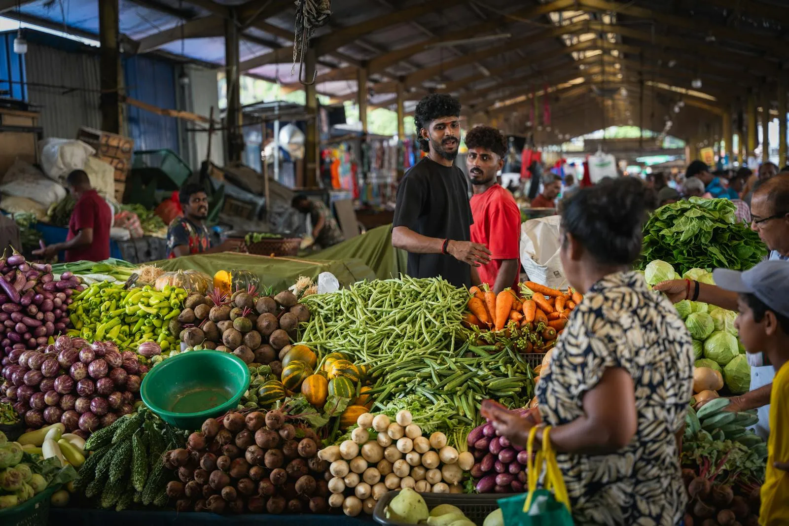 Explore the bustling vegetable market in Pettah, Colombo, showcasing a vibrant array of fresh produce and local culture.
